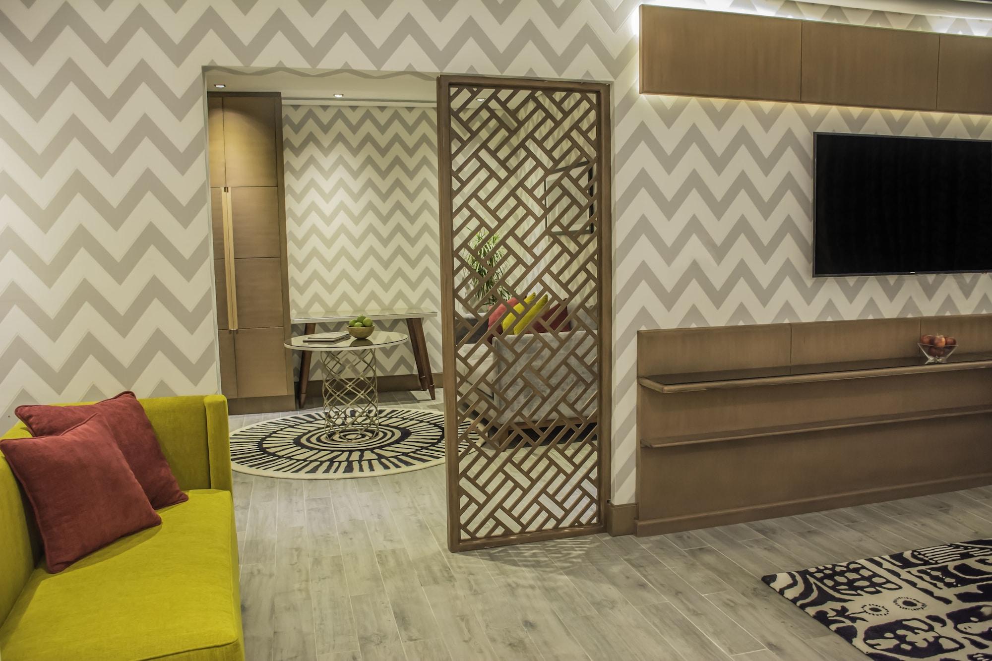 Radisson Blu Resort, Al Khobar Half Moon Bay Exteriör bild A room divider in a living room